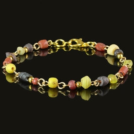 Bracelet with Roman red, purple and yellow glass beads