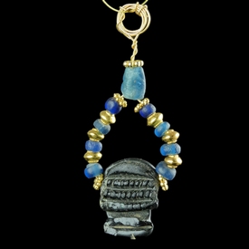 Pendant with Roman blue glass and amulet bead