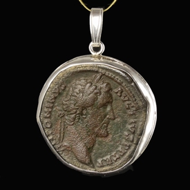 Silver pendant with Roman coin of Antoninus Pius