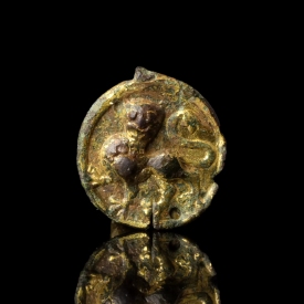 Medieval gilded bronze harness applique with Lion