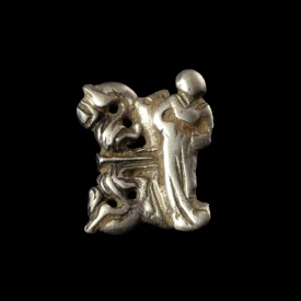 Late Medieval silver openwork dress hook with female figure and floral decoration