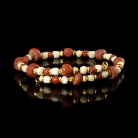 Bracelet with Roman red glass and ancient shell beads in a flexible design