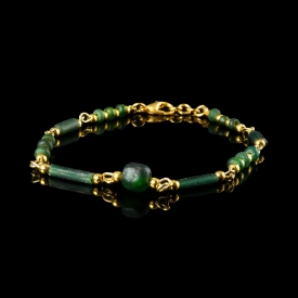 Bracelet with Roman green glass beads in a linked design