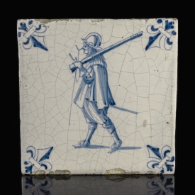 Dutch Delft blue and white tile with Musketeer
