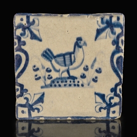 Dutch Delft blue and white tile with Hen