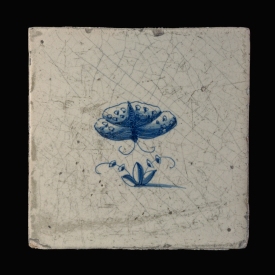 Dutch Delft blue and white tile with a butterfly