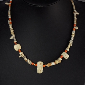 Necklace with ancient stone, shell and coral beads