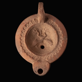Ancient Roman Terracotta Oil Lamp with Dolphins