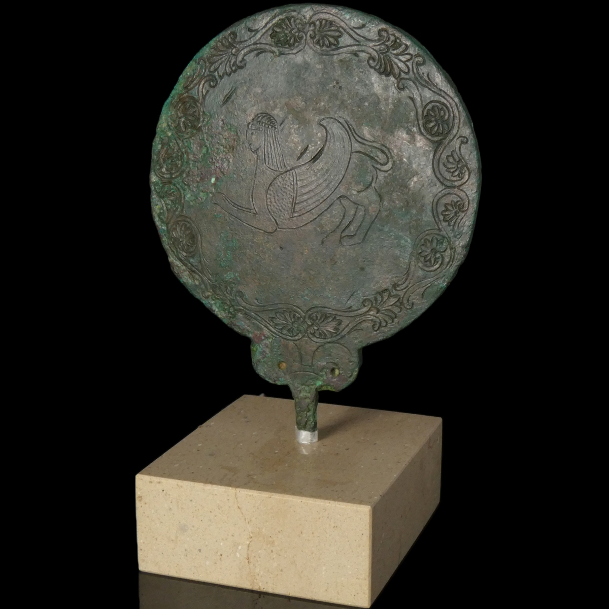 Ancient Etruscan bronze hand mirror, engraved with Sphinx