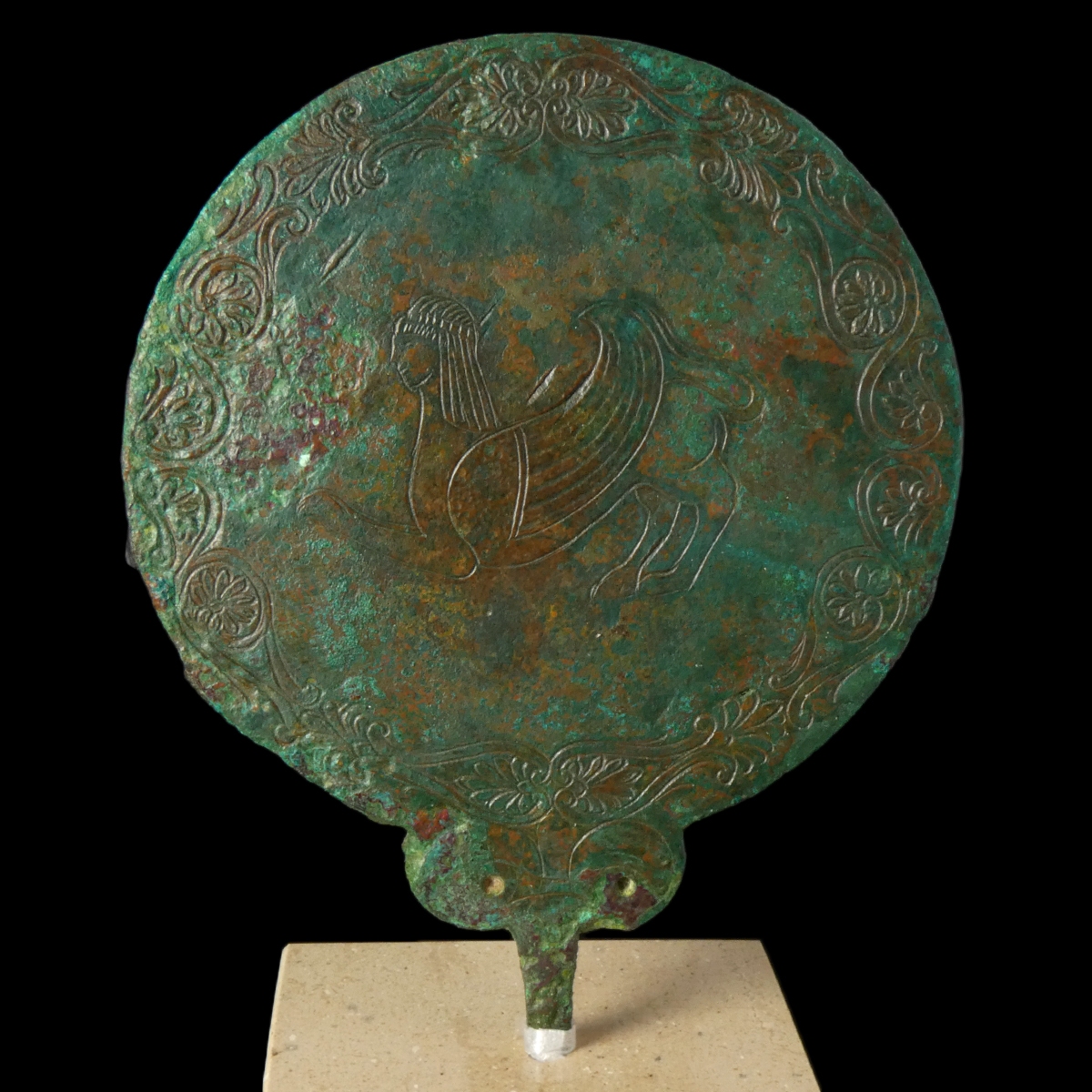 Ancient Etruscan bronze hand mirror, engraved with Sphinx