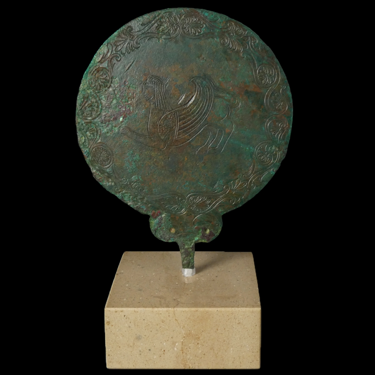 Ancient Etruscan bronze hand mirror, engraved with Sphinx