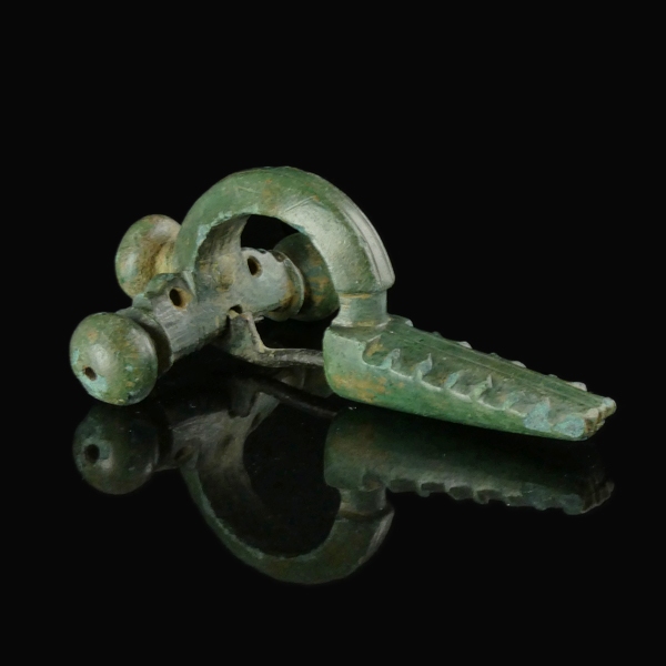 Ancient Roman bronze crossbow fibula