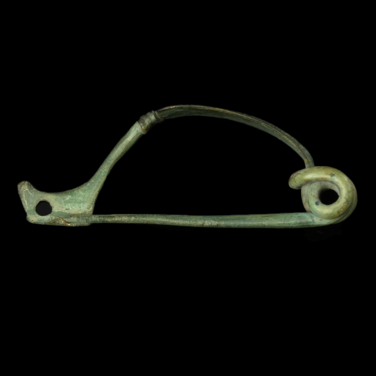 Ancient Roman bronze decorated bow fibula with wolf's head foot