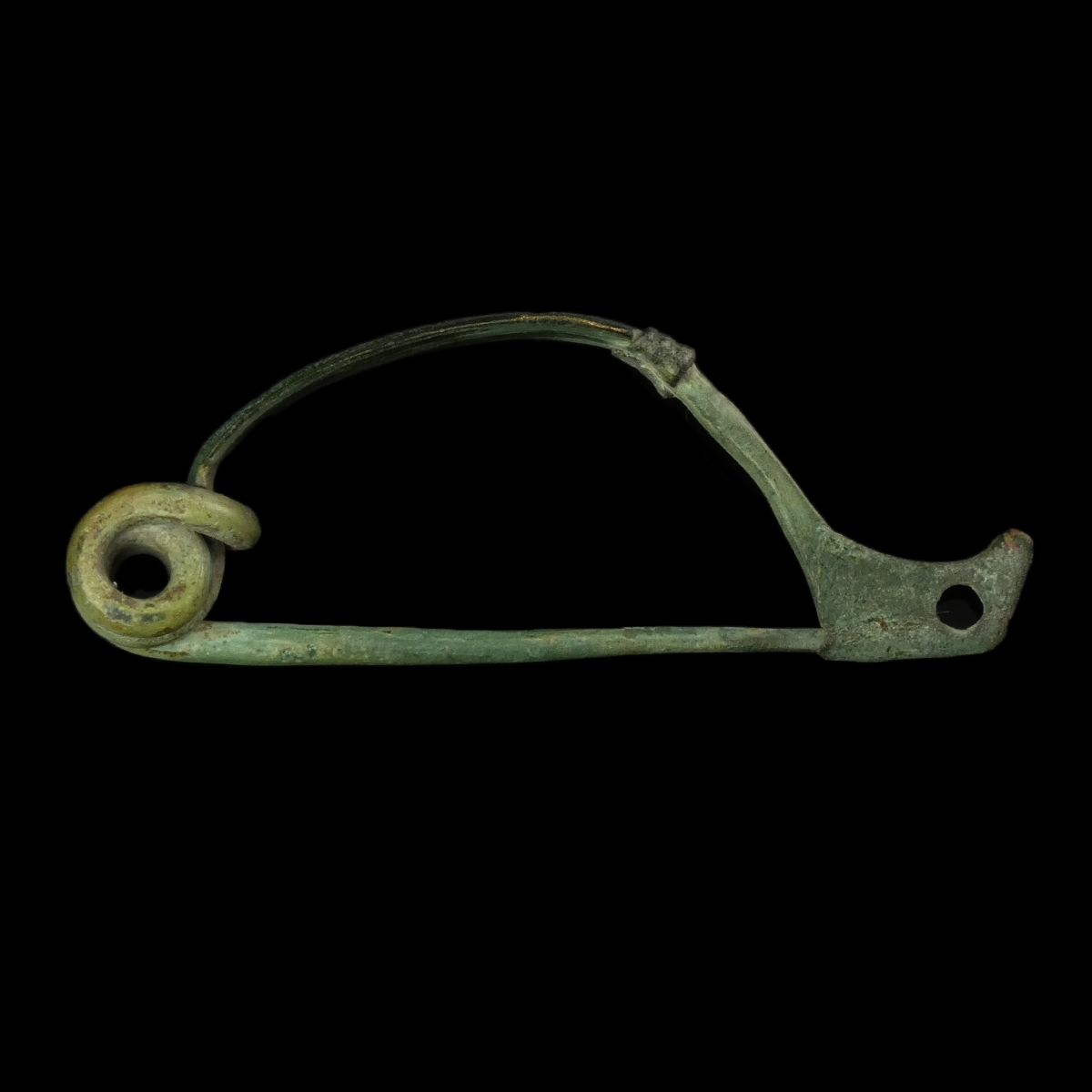 Ancient Roman bronze decorated bow fibula with wolf's head foot