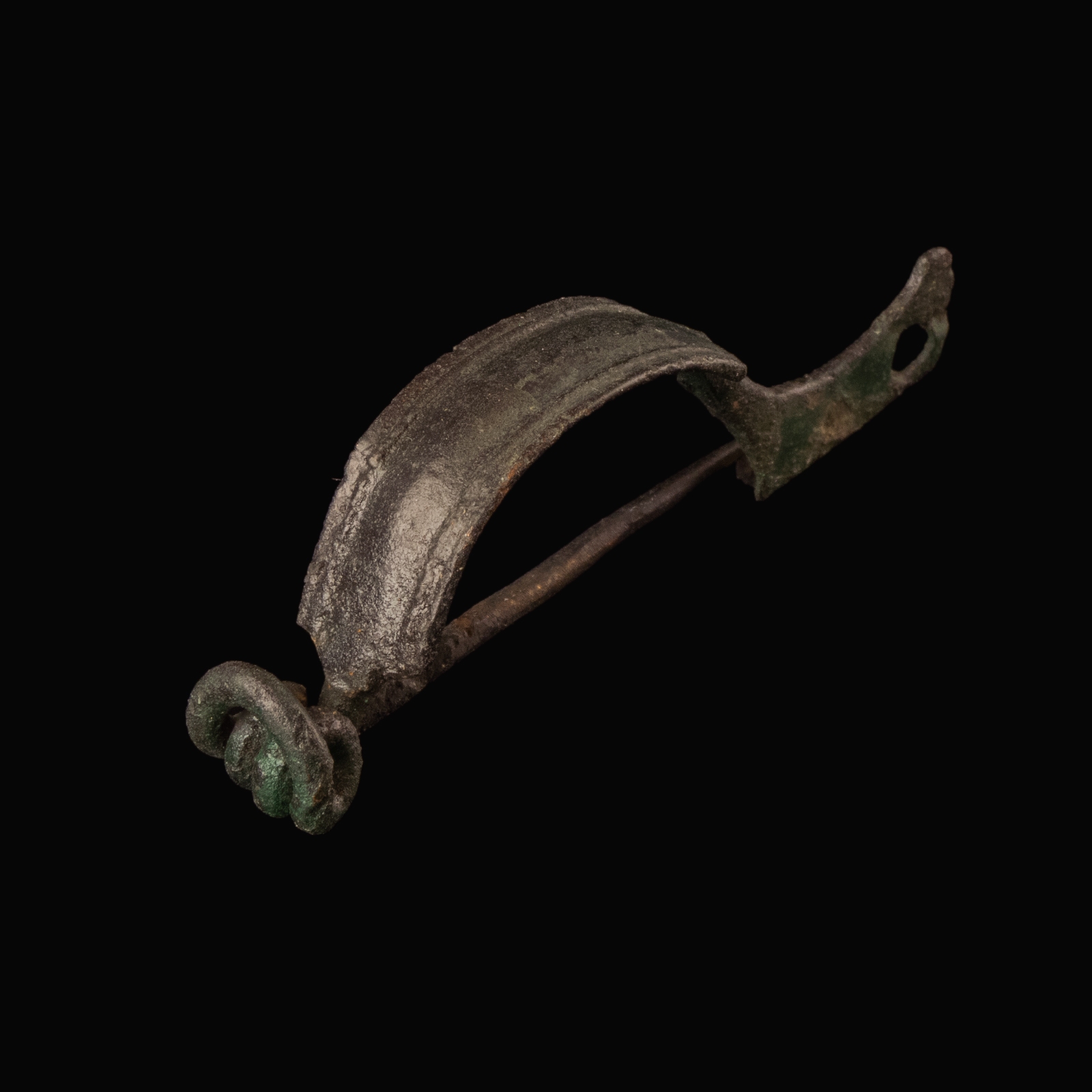 Ancient Roman bronze decorated bow fibula with wolf's head foot