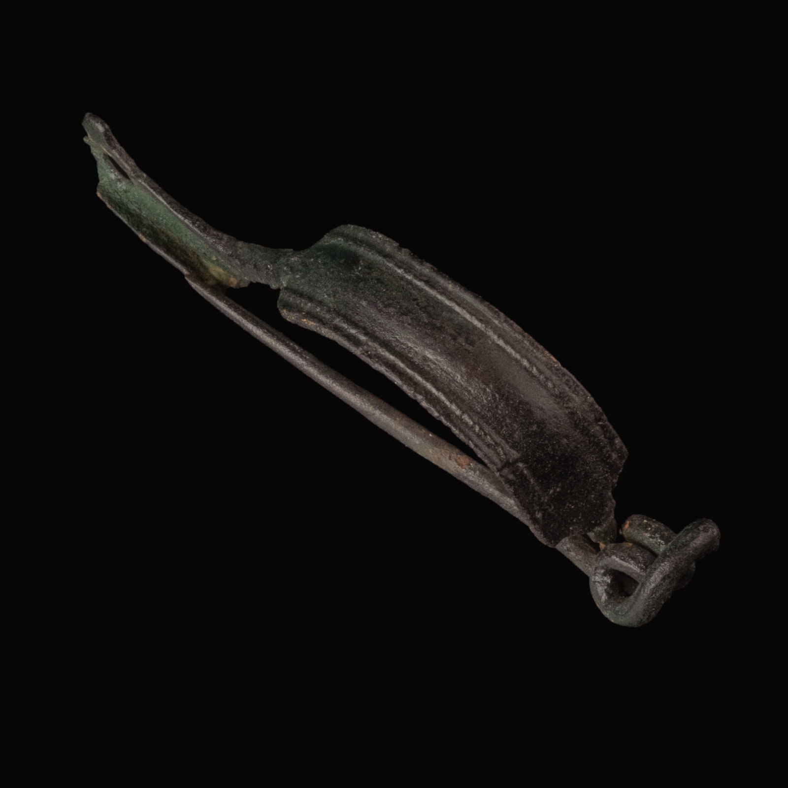 Ancient Roman bronze decorated bow fibula with wolf's head foot