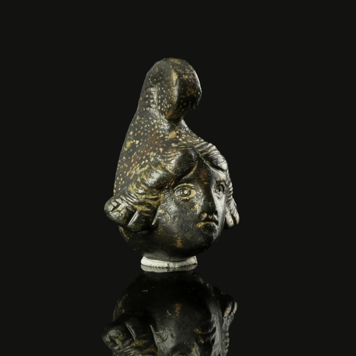 Ancient Roman bronze head of Mithras applique