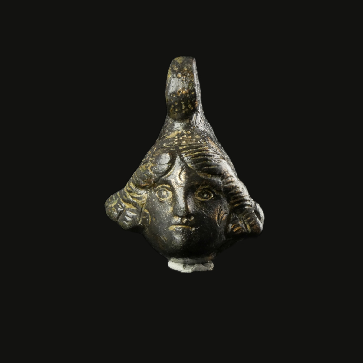 Ancient Roman bronze head of Mithras applique