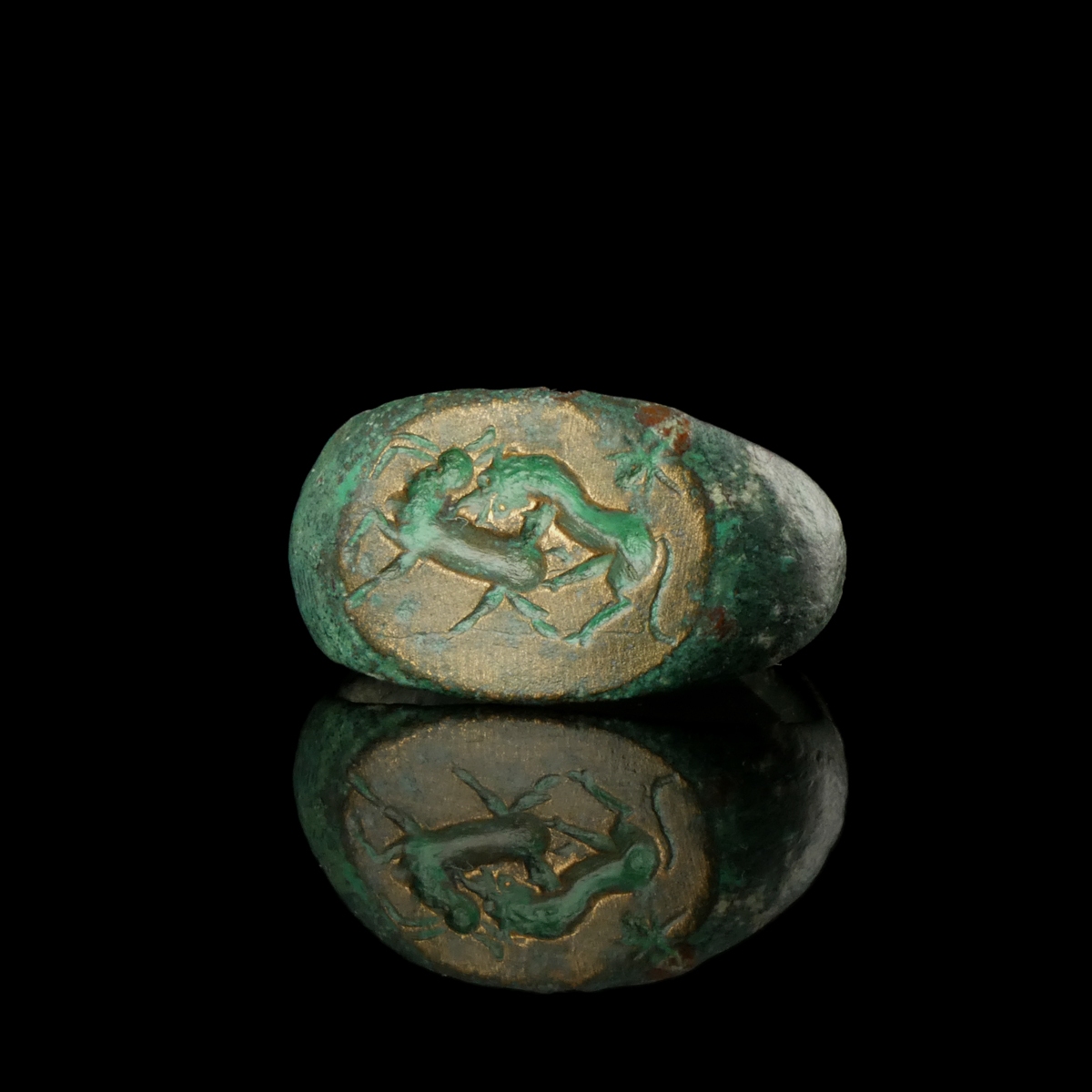 Ancient Roman bronze seal ring, Lion attacking a deer