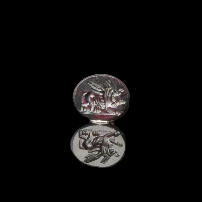 Ancient Roman garnet intaglio with Pegasus