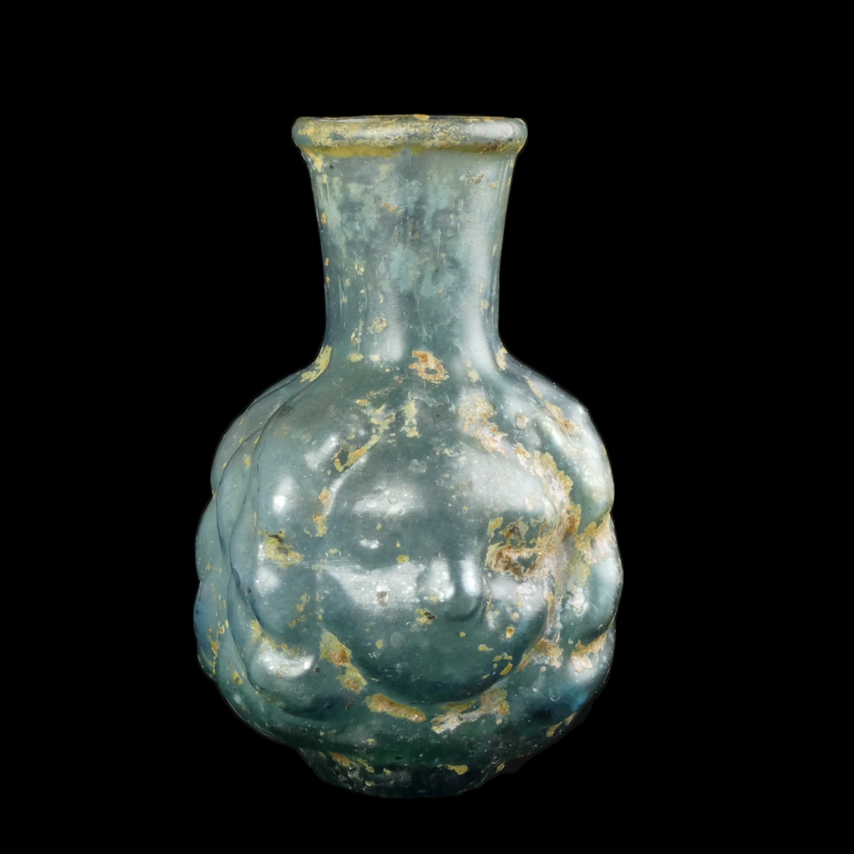 Ancient Roman Janus head glass bottle