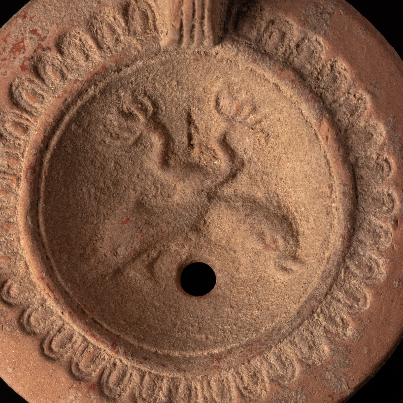 Ancient Roman Terracotta Oil Lamp with Dolphins