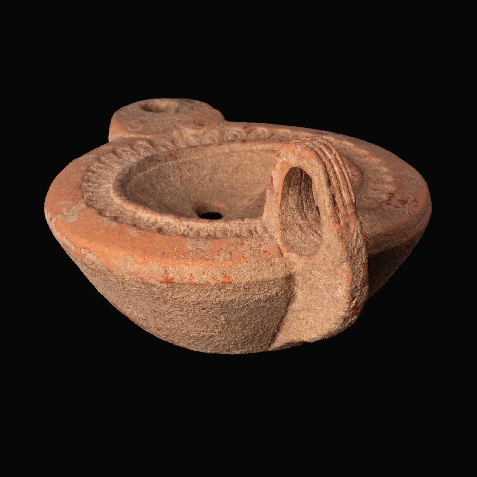 Ancient Roman Terracotta Oil Lamp with Dolphins