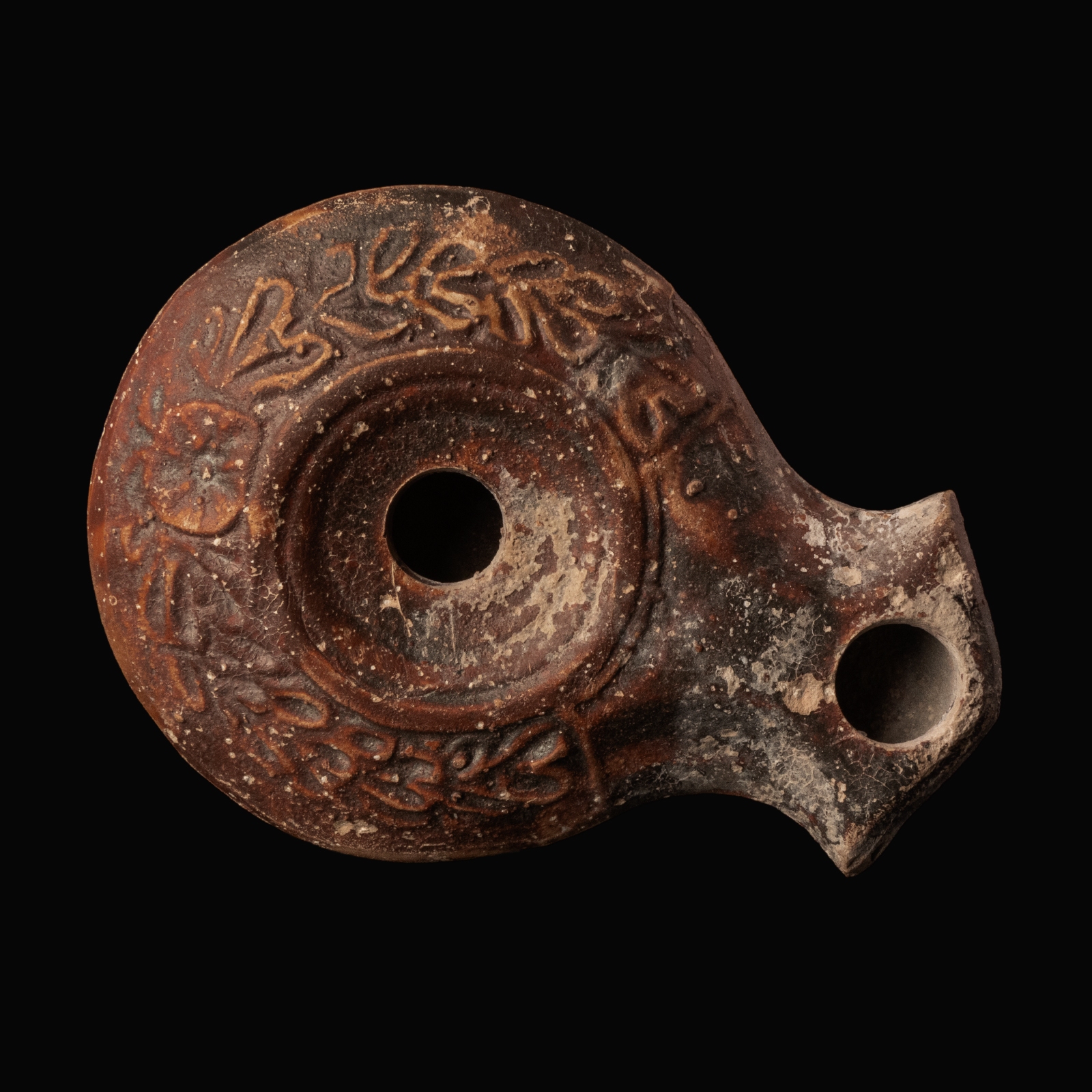 Ancient Roman Terracotta Oil Lamp with Foliate Garland