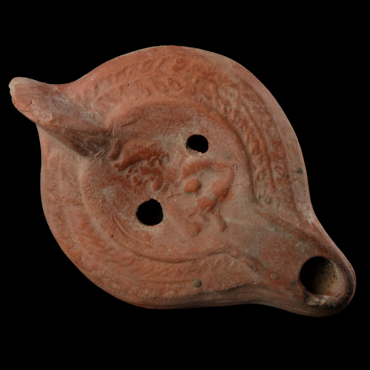 Ancient Roman terracotta oil lamp with warrior