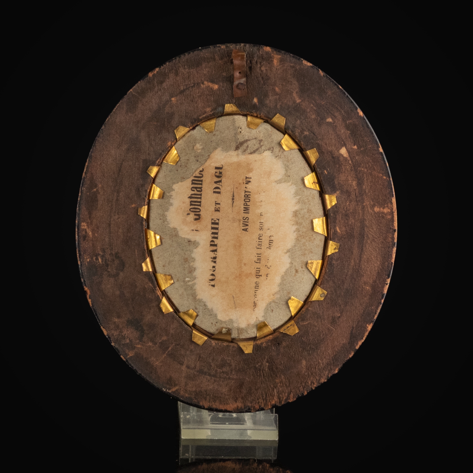 Antique silver devotional plaque of the Madonna and Child in wooden frame