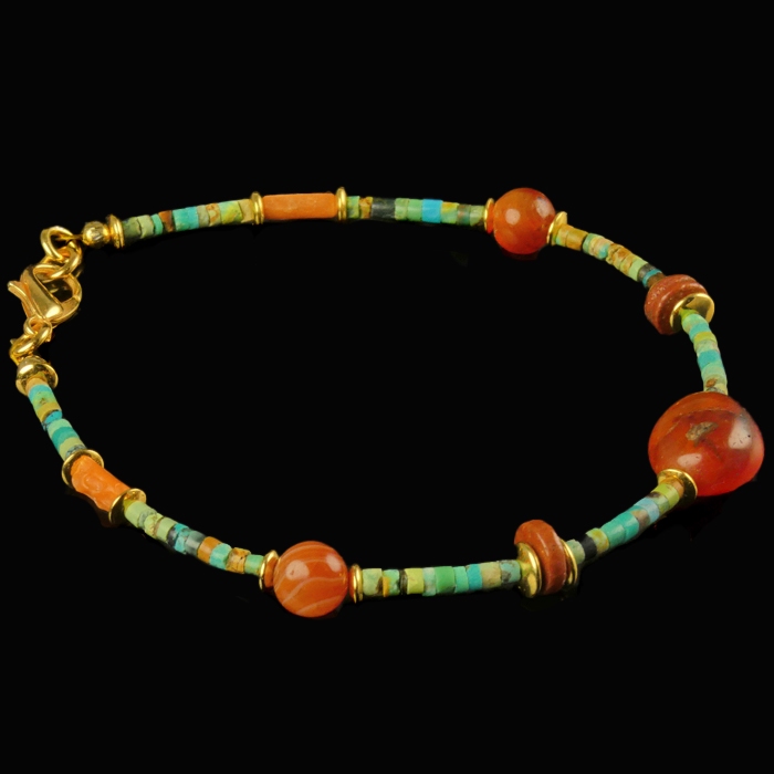 Bracelet with Egyptian faience, carnelian and coral beads