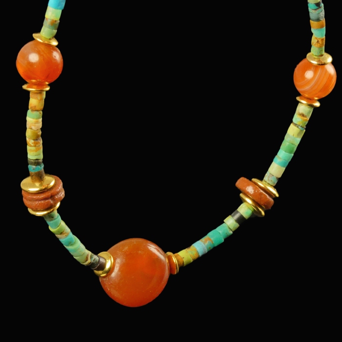 Bracelet with Egyptian faience, carnelian and coral beads