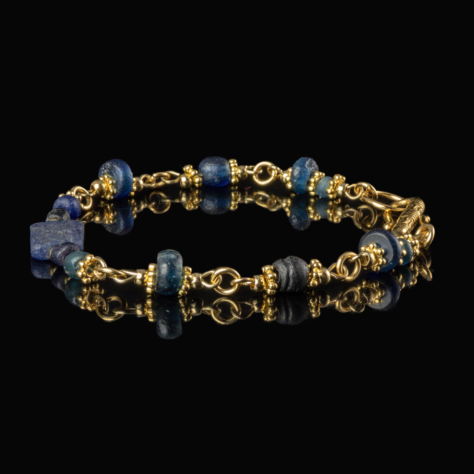 Bracelet with Roman blue glass beads in a linked design