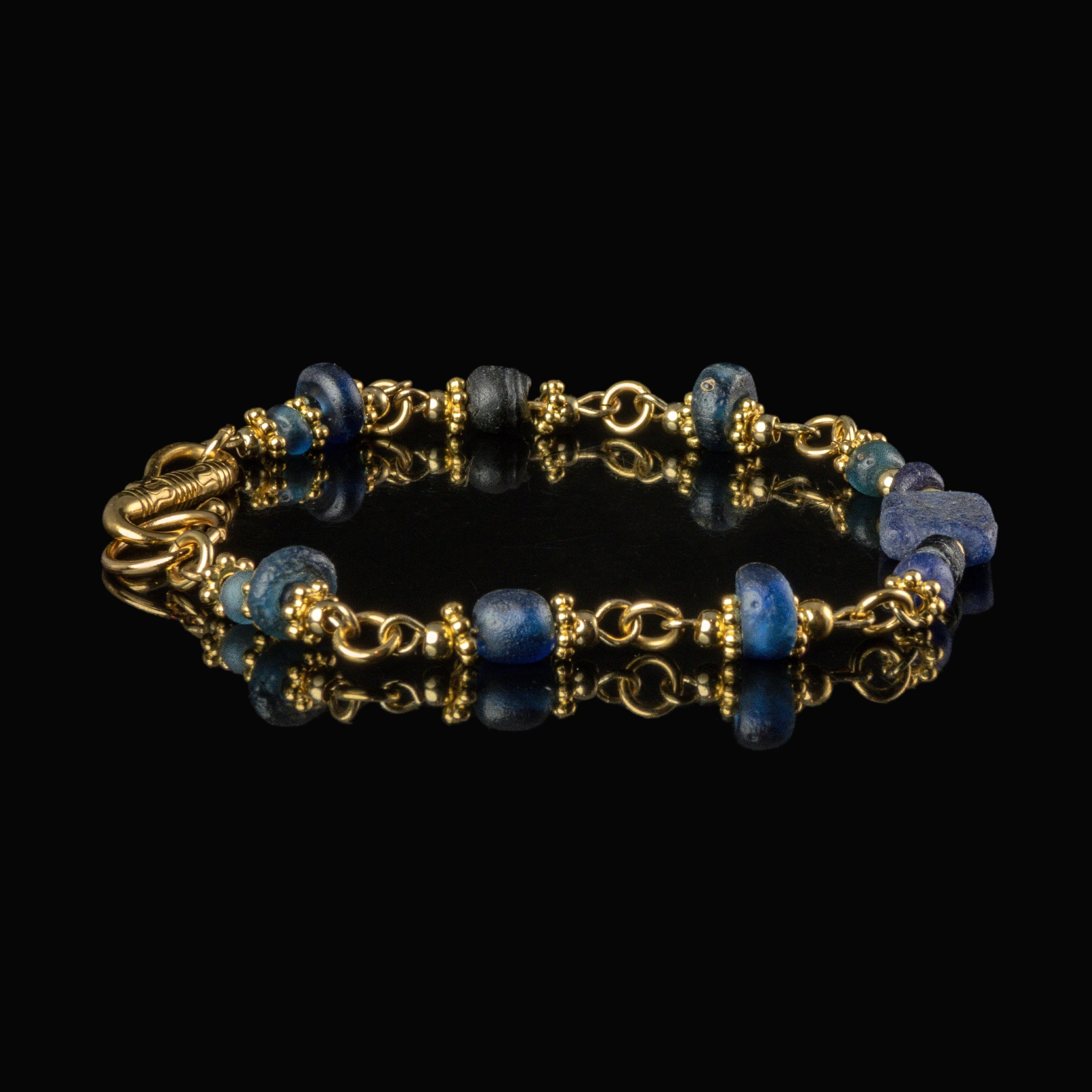 Bracelet with Roman blue glass beads in a linked design