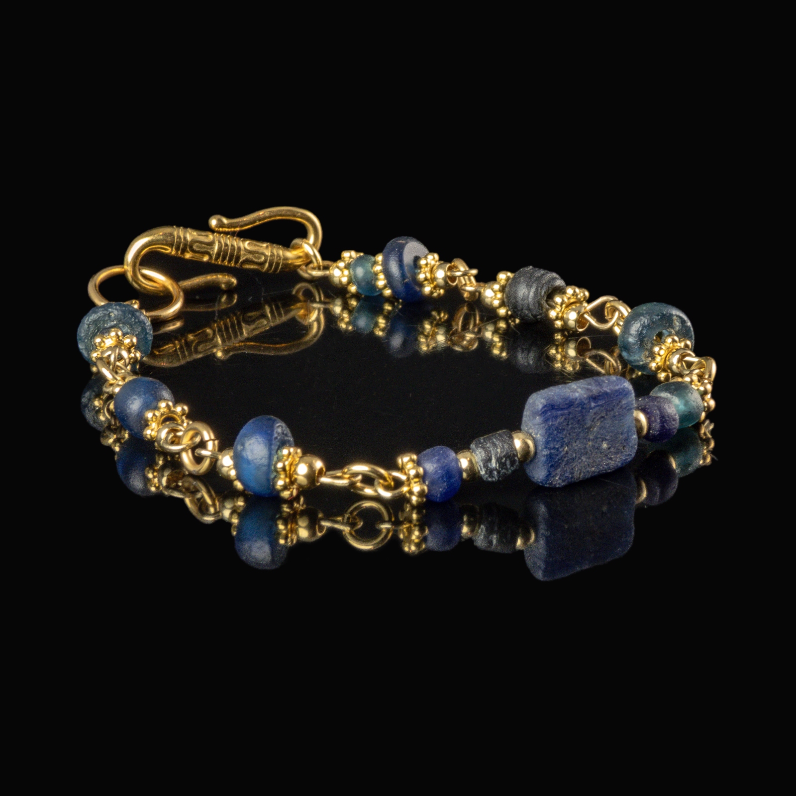 Bracelet with Roman blue glass beads in a linked design