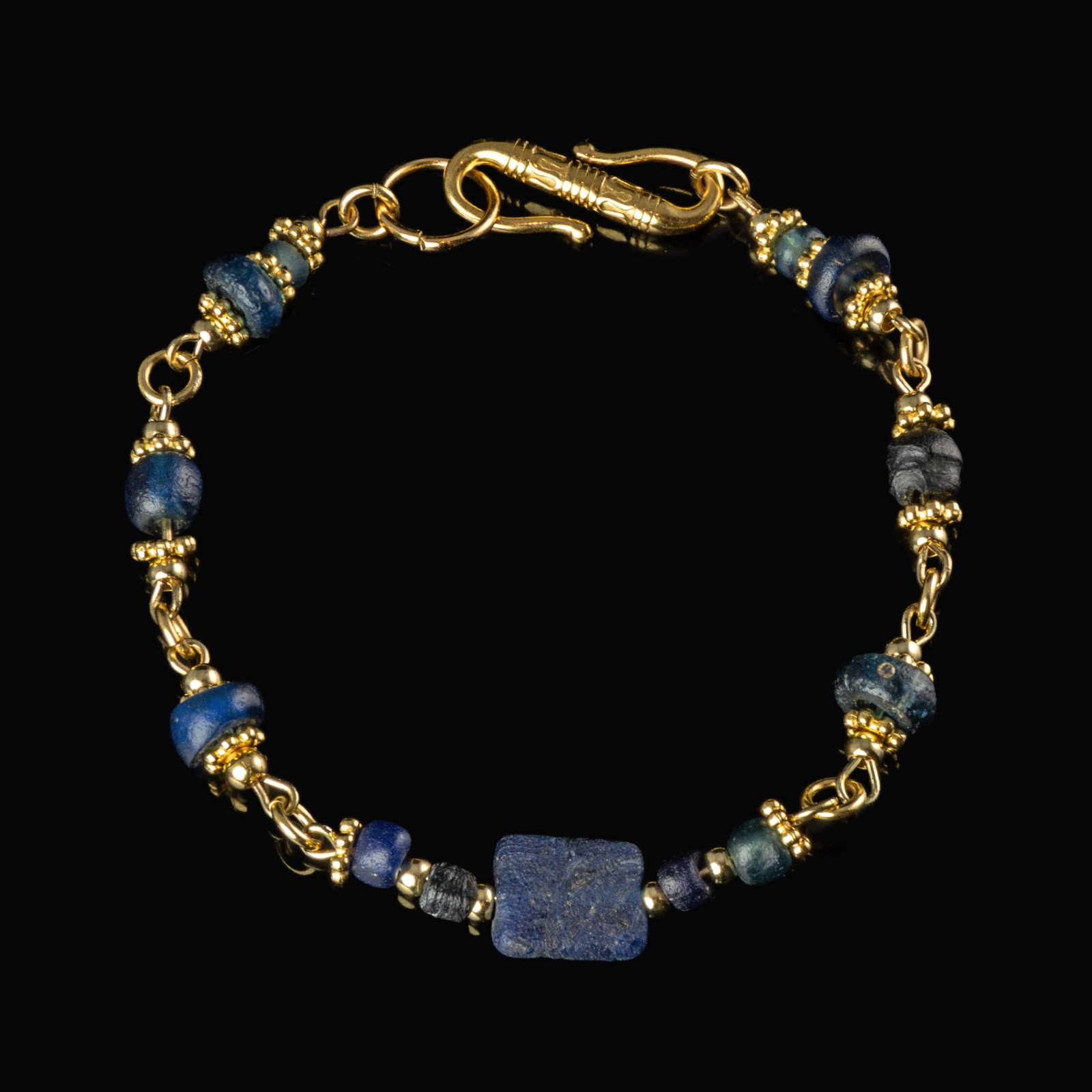 Bracelet with Roman blue glass beads in a linked design