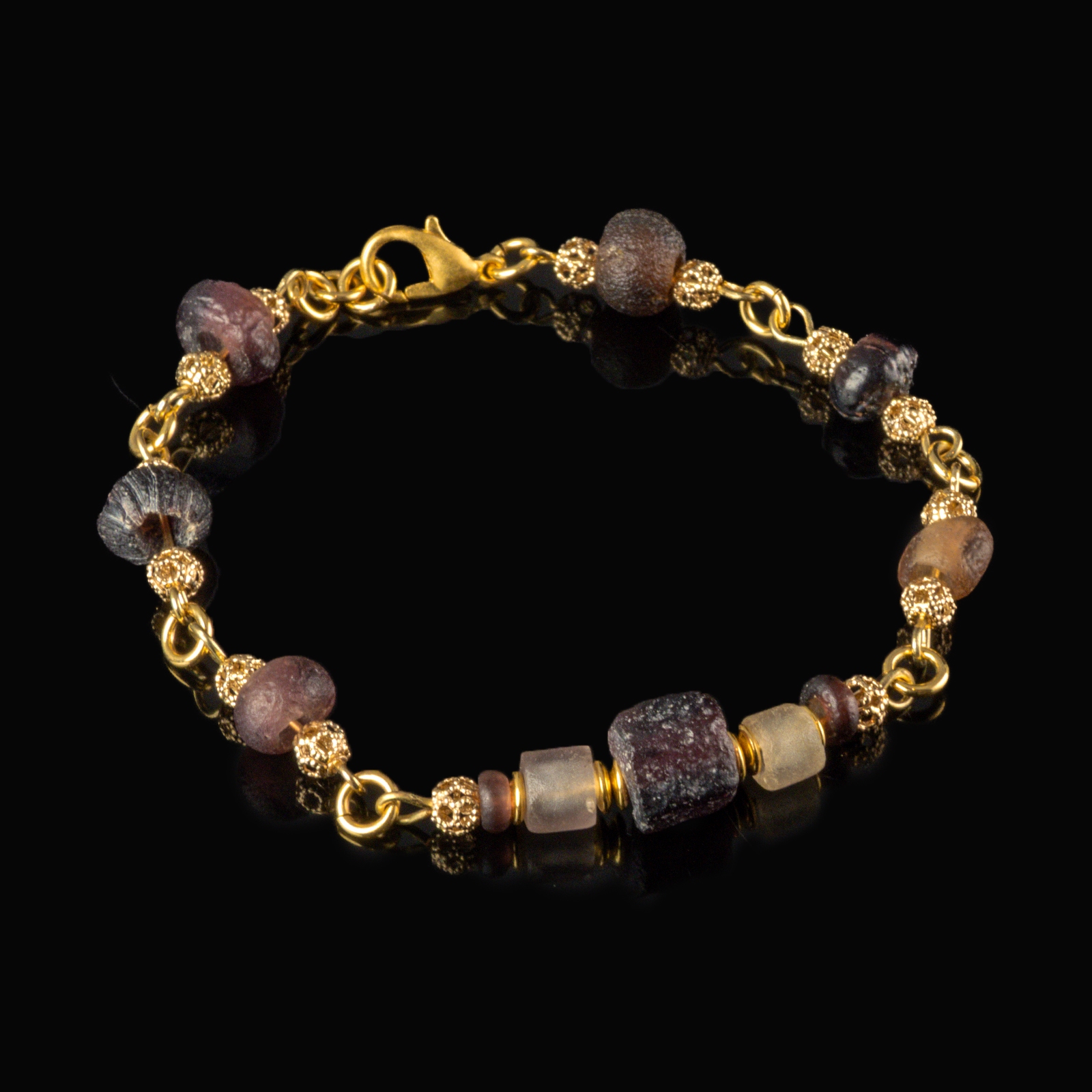 Bracelet with Roman purple and semi-translucent glass beads in a linked design