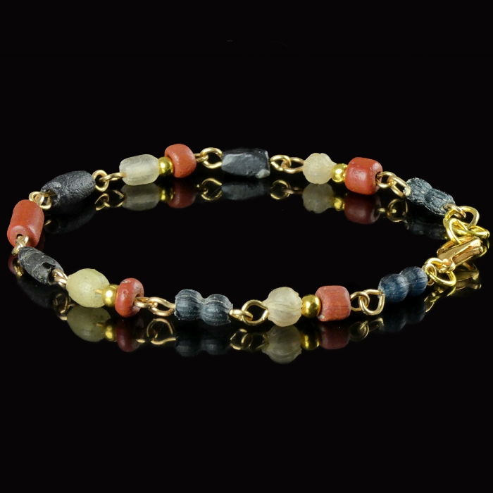 Bracelet with Roman red, black, semi-translucent glass beads