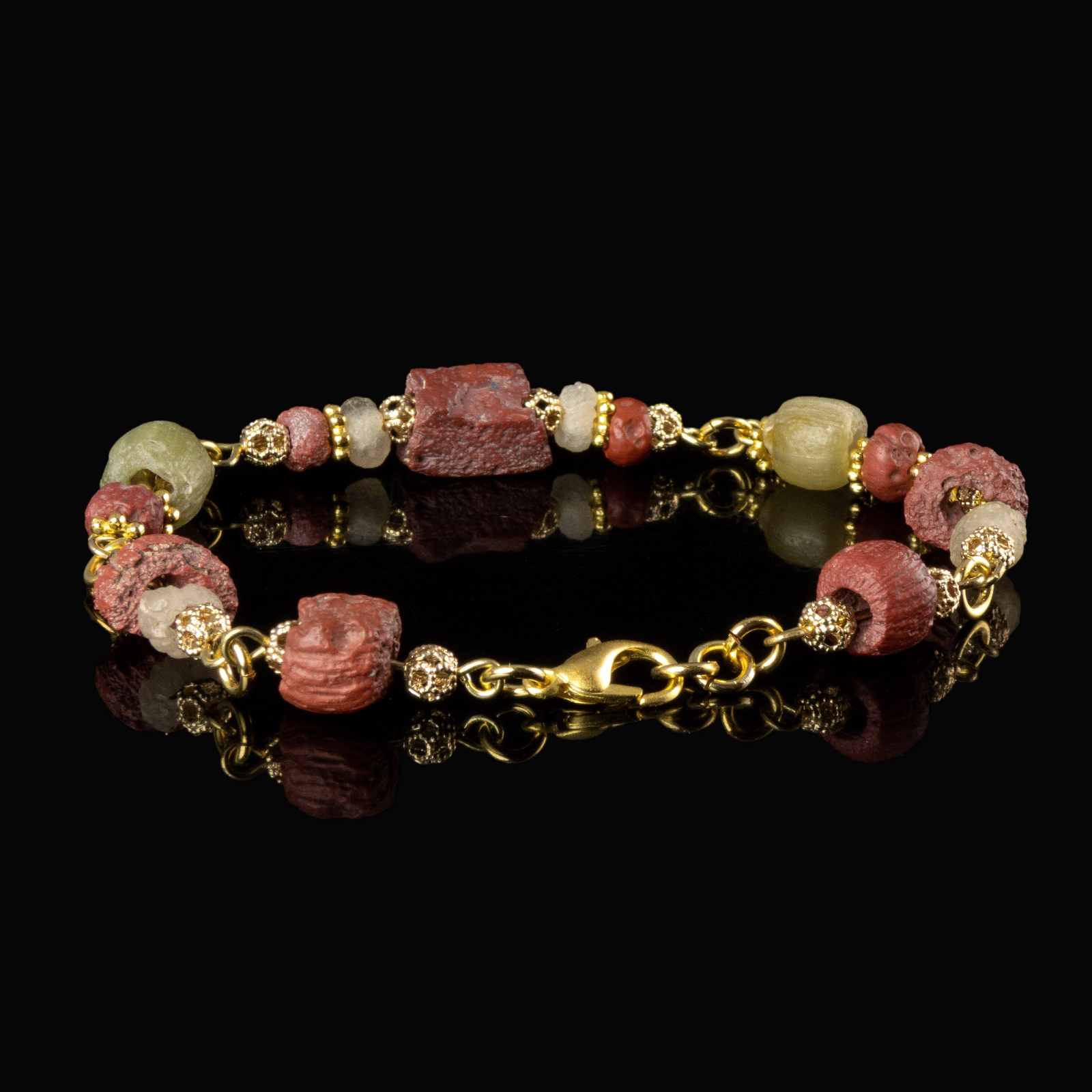 Bracelet with Roman red and semi-translucent glass beads in a linked design