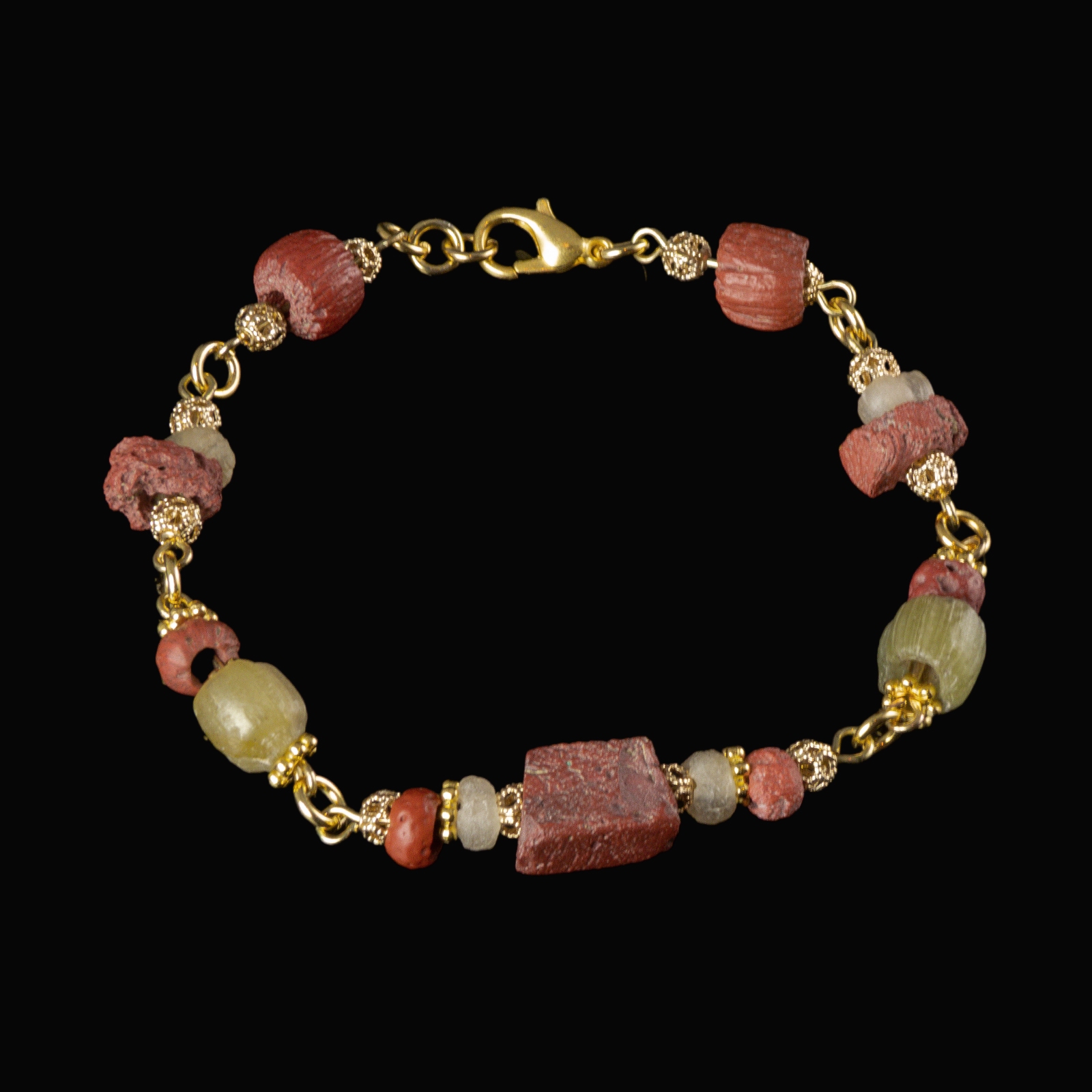 Bracelet with Roman red and semi-translucent glass beads in a linked design
