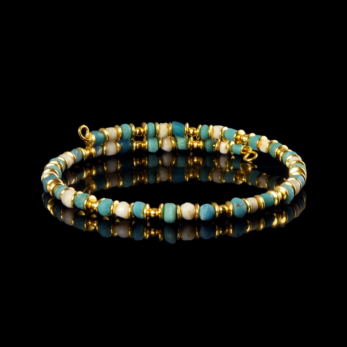 Bracelet with Roman turquoise glass and shell beads in a flexible design
