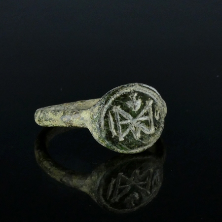 Byzantine bronze ring with monogram and cross
