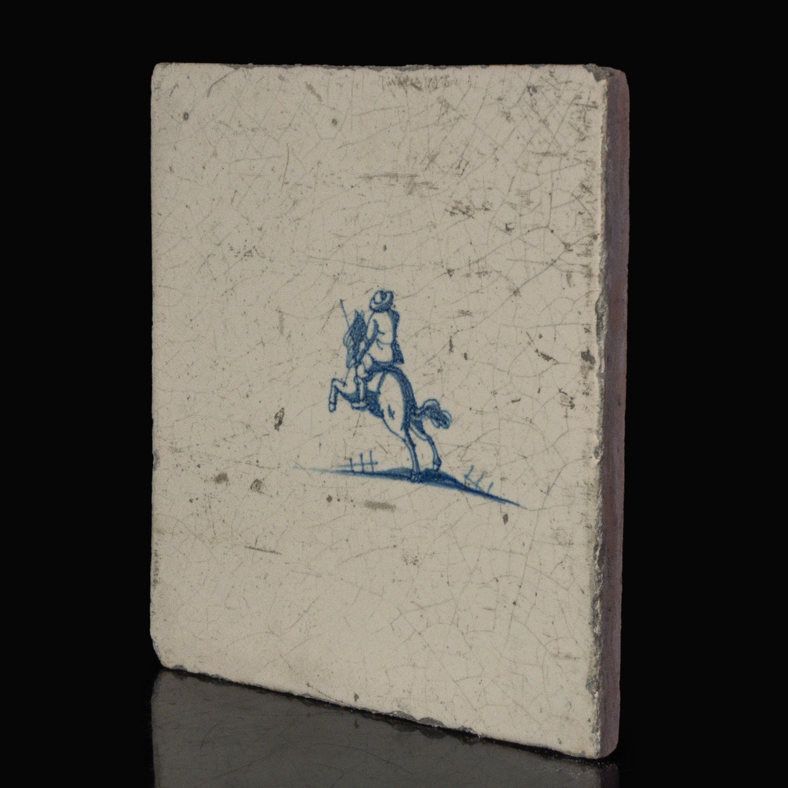 Dutch Delft blue and white tile with a Rider on horseback