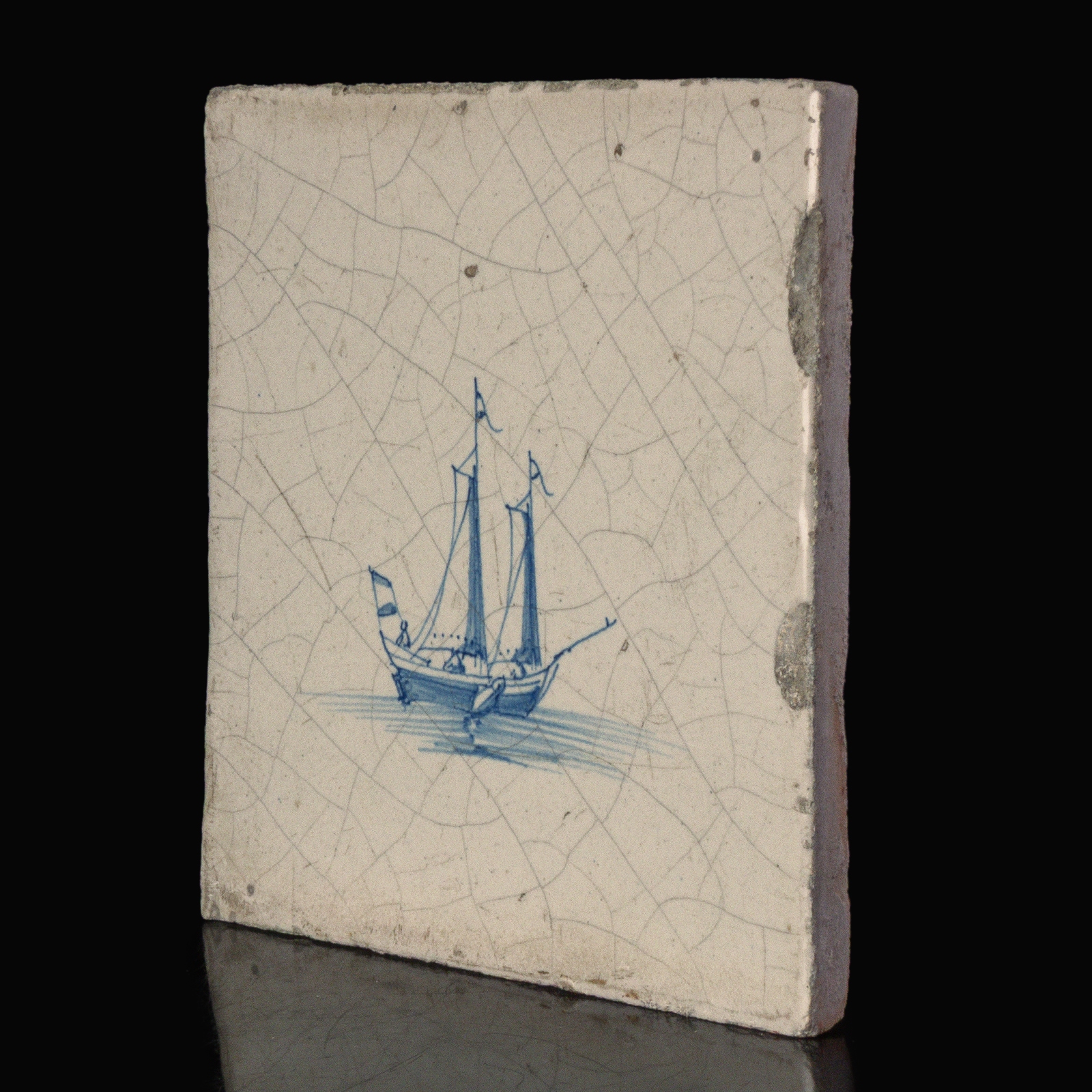 Dutch Delft blue and white tile with a Sailing ship