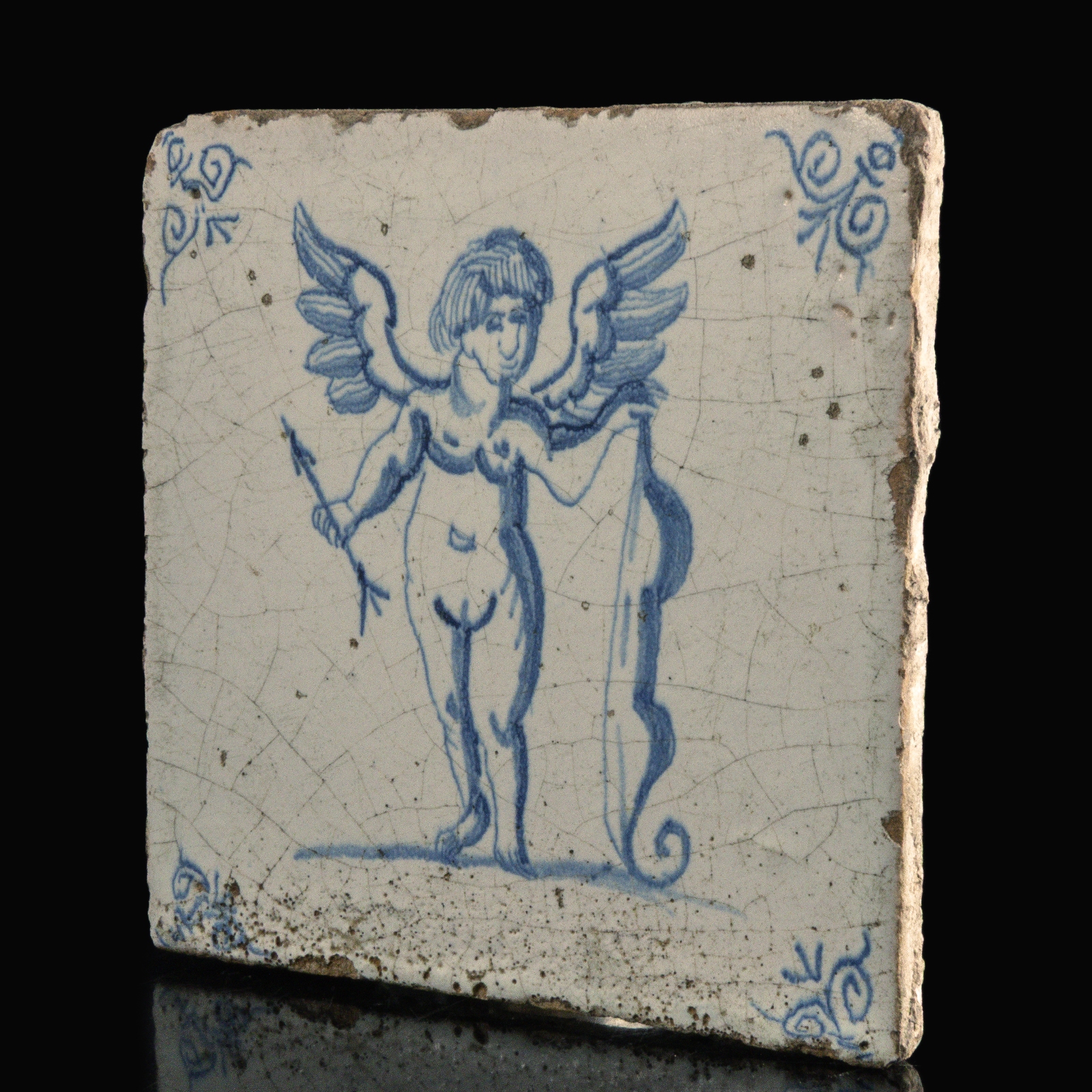 Dutch Delft blue and white tile with Amor