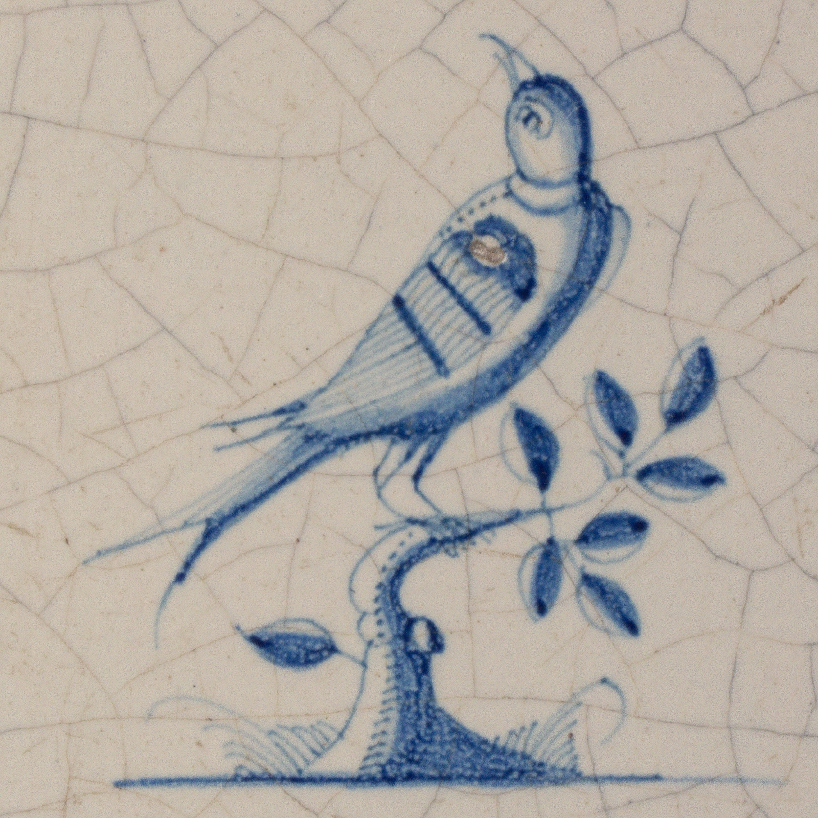 Dutch Delft blue and white tile with Bird on a branch
