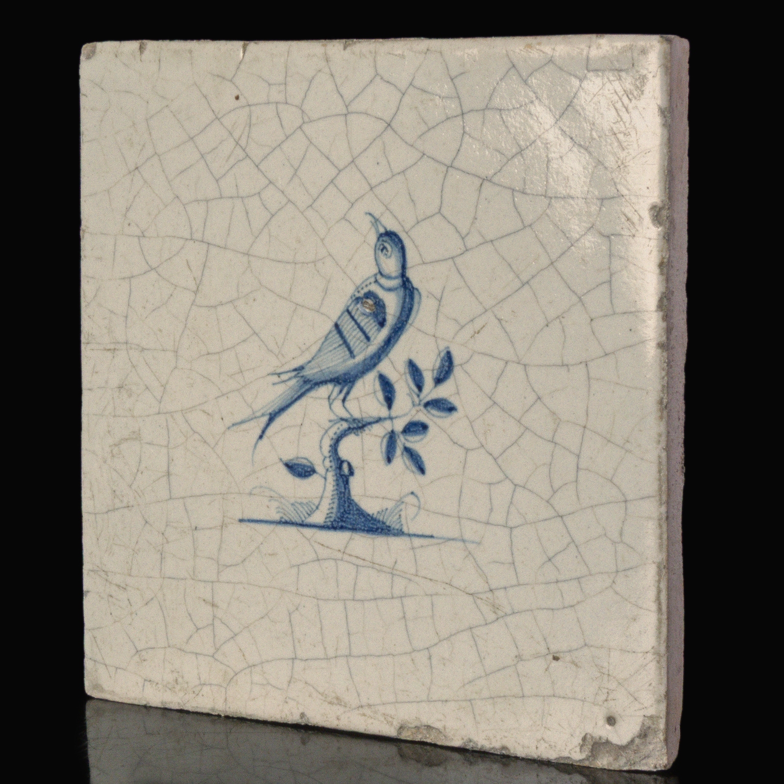 Dutch Delft blue and white tile with Bird on a branch