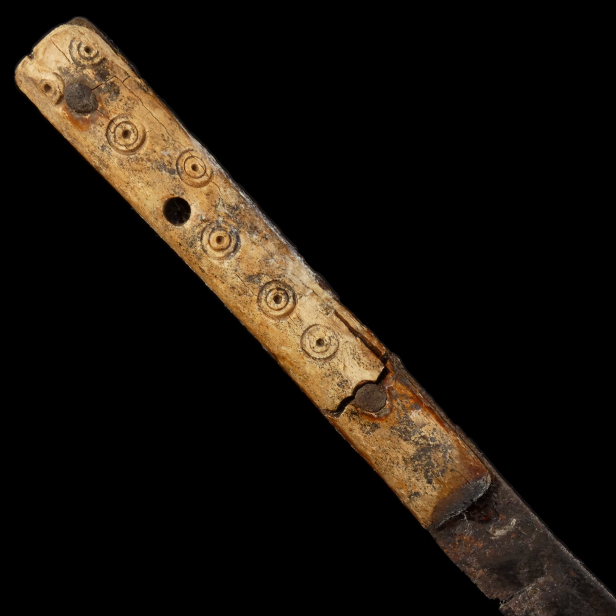 Early Medieval iron knife with decorated bone handle