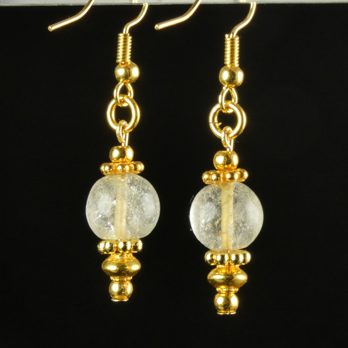 Earrings with ancient rock crystal melon beads