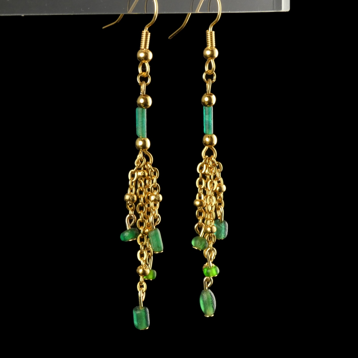 Earrings with Roman green glass beads